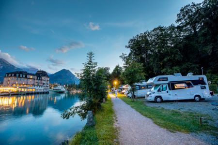 Pitches for mobile homes and caravans on the banks of the River Aare at TCS Camping Interlaken Switzerland