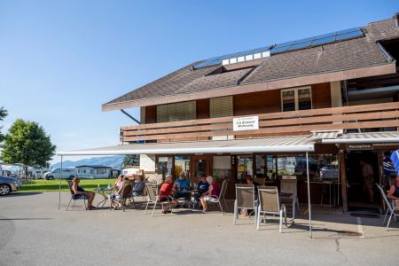 Reception with restaurant and shop at Camping Stuhlegg in Krattigen - Interlaken, Switzerland