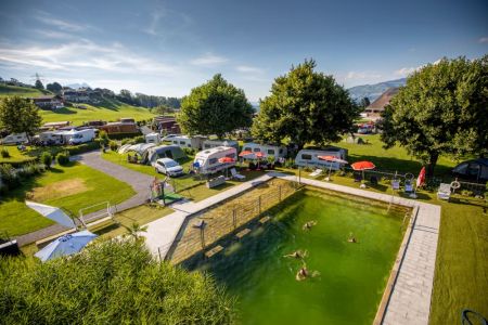 Large natural bathing pond at Camping Stuhlegg Krattigen Interlaken Switzerland