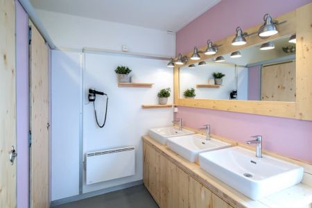 Modern sanitary facilities in the Riverlodge Hostel at TCS Camping Interlaken Switzerland